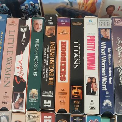 Huge library of VHS tapes = All kinds of GREAT movie titles!