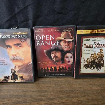 Movies on DVD some still sealed - mostly all westerns