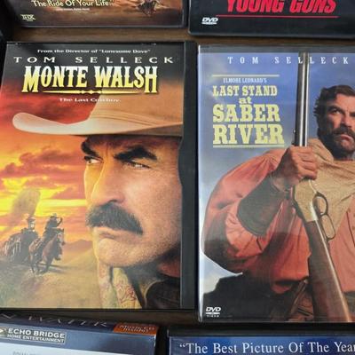Movies on DVD some still sealed - mostly all westerns