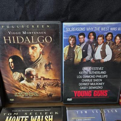 Movies on DVD some still sealed - mostly all westerns