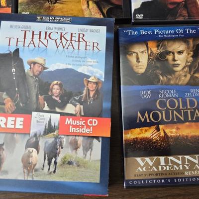 Movies on DVD some still sealed - mostly all westerns