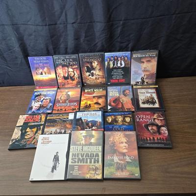 Movies on DVD some still sealed - mostly all westerns