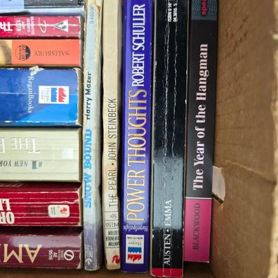 Assortment of paperback books - box full