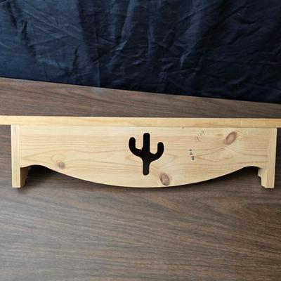 Decorative wooden shelf with cactus and two small wooden boxes also wood burned to match