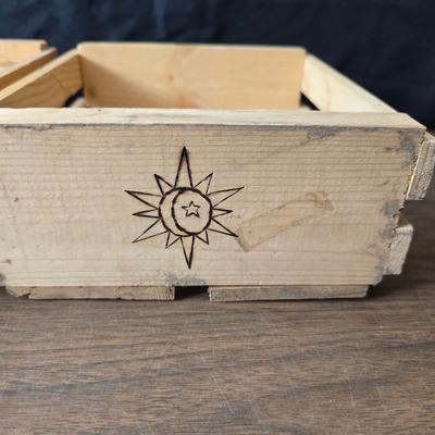 Decorative wooden shelf with cactus and two small wooden boxes also wood burned to match