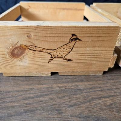 Decorative wooden shelf with cactus and two small wooden boxes also wood burned to match