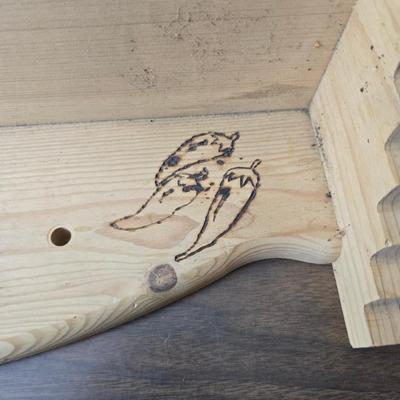 Decorative wooden shelf with cactus and two small wooden boxes also wood burned to match