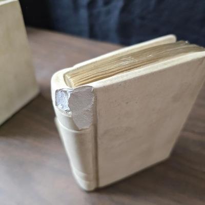 Universal Statuary Corp. mid-century chalkware bookends, featuring a floral design with an assortment of old books