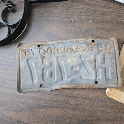 Antique lamp burner - old license plates other neat old trinkets