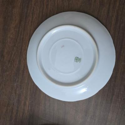 Mid Century French Petitie Choses Brass Candle Holder with a variety of vintage floral China plates