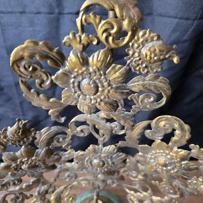 Mid Century French Petitie Choses Brass Candle Holder with a variety of vintage floral China plates