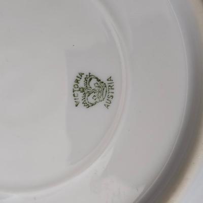 Mid Century French Petitie Choses Brass Candle Holder with a variety of vintage floral China plates