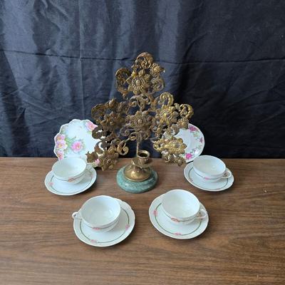Mid Century French Petitie Choses Brass Candle Holder with a variety of vintage floral China plates