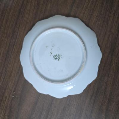 Mid Century French Petitie Choses Brass Candle Holder with a variety of vintage floral China plates