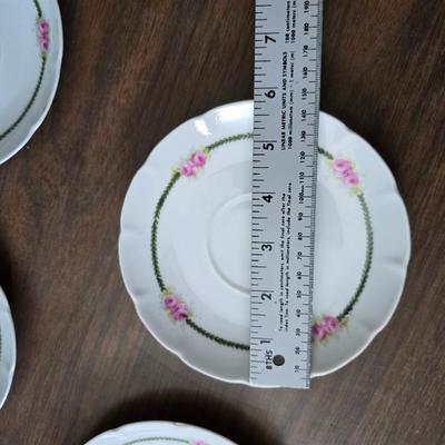 Mid Century French Petitie Choses Brass Candle Holder with a variety of vintage floral China plates