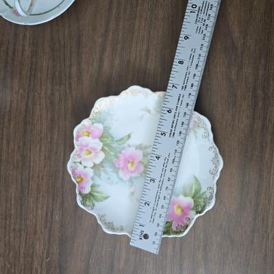 Mid Century French Petitie Choses Brass Candle Holder with a variety of vintage floral China plates