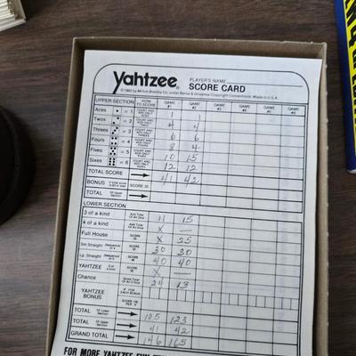 Variety of board games - All about Greeley - Triopley - Family Feud and Yahtzee