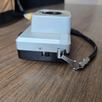 Vintage Minolta autopak 550 camera with a nice camera case and extras!