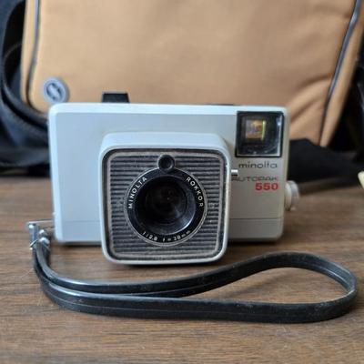 Vintage Minolta autopak 550 camera with a nice camera case and extras!