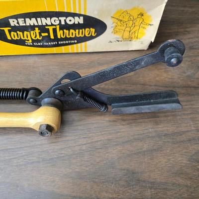 Vintage Remington target thrower for clay shooting and a pocket knife