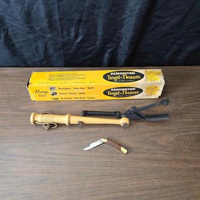 Vintage Remington target thrower for clay shooting and a pocket knife
