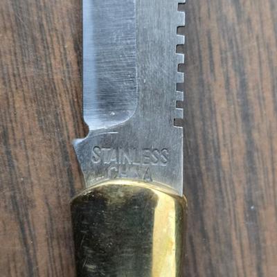 Vintage Remington target thrower for clay shooting and a pocket knife