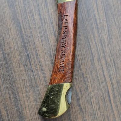 Vintage Remington target thrower for clay shooting and a pocket knife