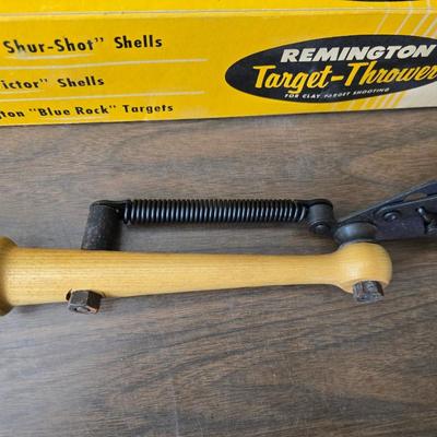 Vintage Remington target thrower for clay shooting and a pocket knife