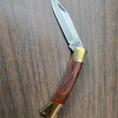 Vintage Remington target thrower for clay shooting and a pocket knife