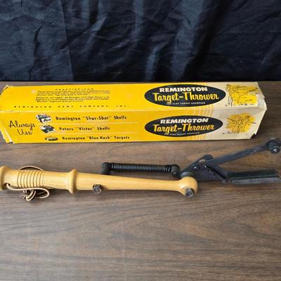 Vintage Remington target thrower for clay shooting and a pocket knife