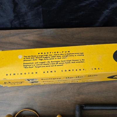 Vintage Remington target thrower for clay shooting and a pocket knife