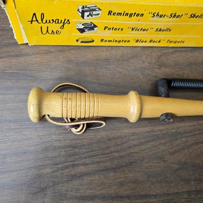 Vintage Remington target thrower for clay shooting and a pocket knife