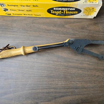 Vintage Remington target thrower for clay shooting and a pocket knife