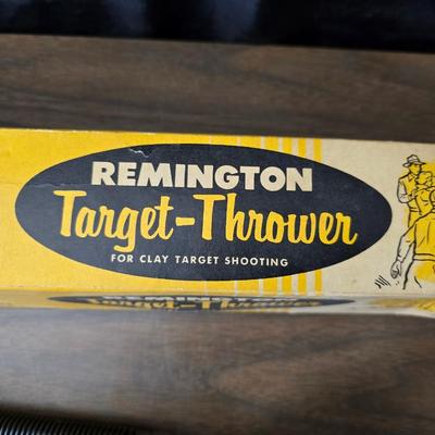 Vintage Remington target thrower for clay shooting and a pocket knife