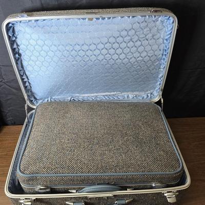 Vintage Ameilia Earhart nesting luggage set