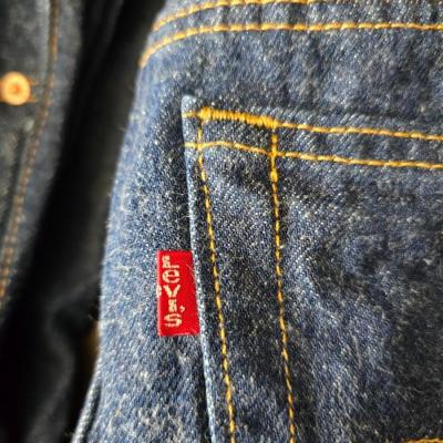 Two pair of red leather tag Levi 501 jeans Size 38 x 33 like new!