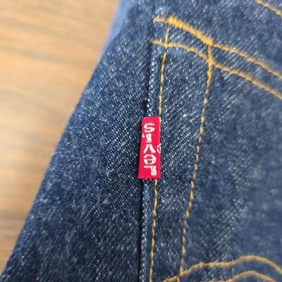 Two pair of red leather tag Levi 501 jeans Size 38 x 33 like new!