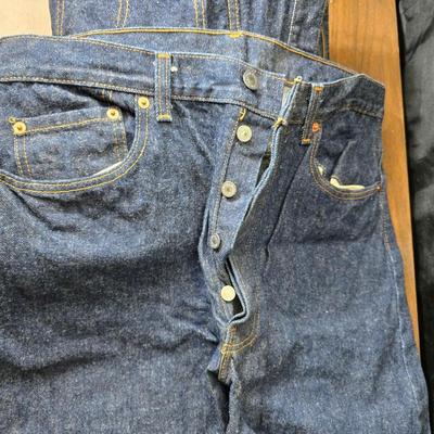 Two pair of red leather tag Levi 501 jeans Size 38 x 33 like new!