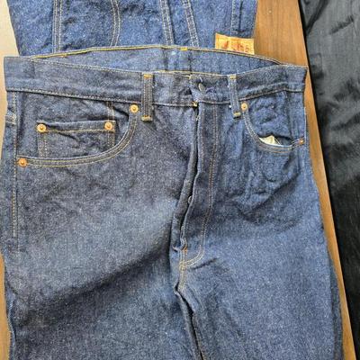 Two pair of red leather tag Levi 501 jeans Size 38 x 33 like new!