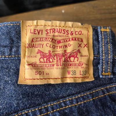 Two pair of red leather tag Levi 501 jeans Size 38 x 33 like new!