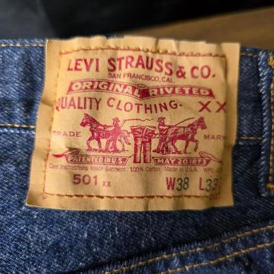 Two pair of red leather tag Levi 501 jeans Size 38 x 33 like new!