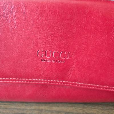 Two red purses - Gucci made in Italy - and Clarks
