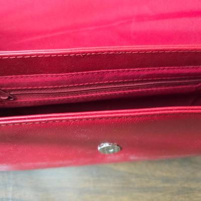 Two red purses - Gucci made in Italy - and Clarks