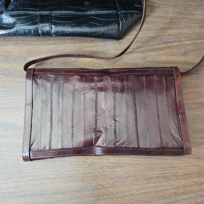 Crocodile skin like purses - large black one and a brown one with a small white wallet