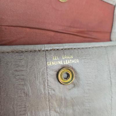 Crocodile skin like purses - large black one and a brown one with a small white wallet