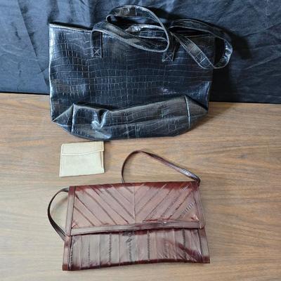 Crocodile skin like purses - large black one and a brown one with a small white wallet