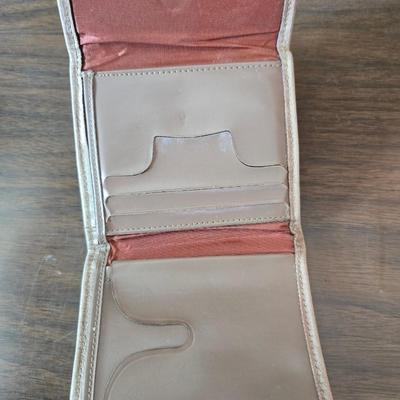 Crocodile skin like purses - large black one and a brown one with a small white wallet