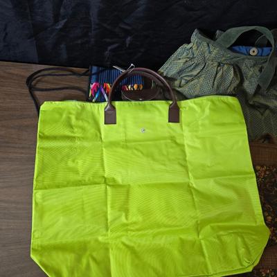 Large hobo like handbags and two smaller purses