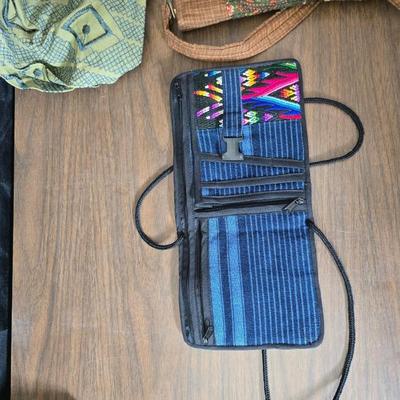 Large hobo like handbags and two smaller purses