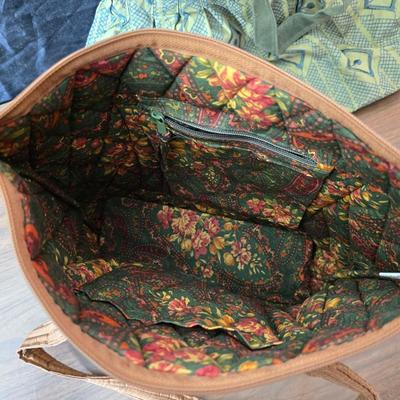 Large hobo like handbags and two smaller purses